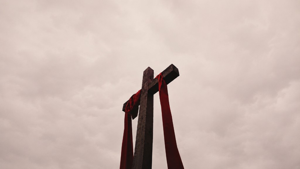Cross silhouette against a warm sky
